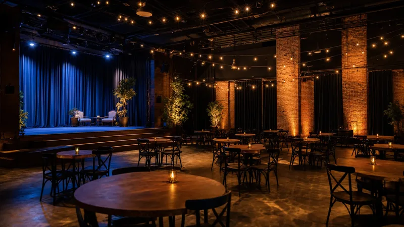 Empty event venue with a small stage and string lights, Chicago Public Place of Amusement (PPA) License for Venues and Events